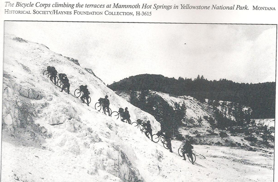 The Bicicle Corps climbing the terraces at Mammouth Hot Springs